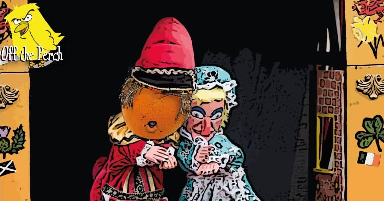 A Punch and Judy puppet show. Punch has Trump's face, and the face is that of an angry looking tangerine.