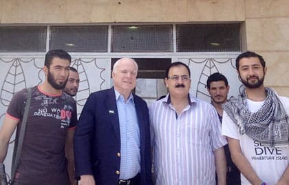 McCain pictured with members of FSA in Syria