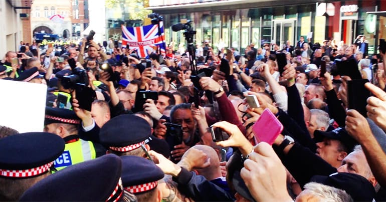 People taking photos of Tommy Robinson outside Old Bailey