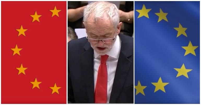 Jeremy Corbyn flanked by a red and blue EU flag either side of him