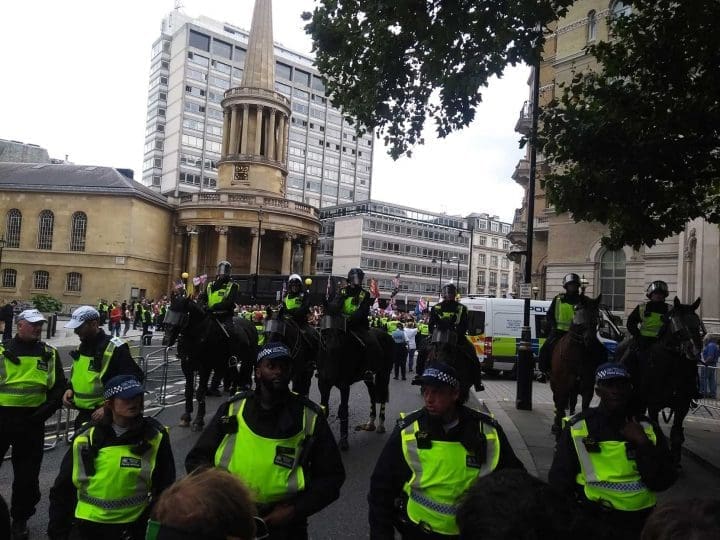 Line of police between Free Tommy protesters and anti-fascist protesters