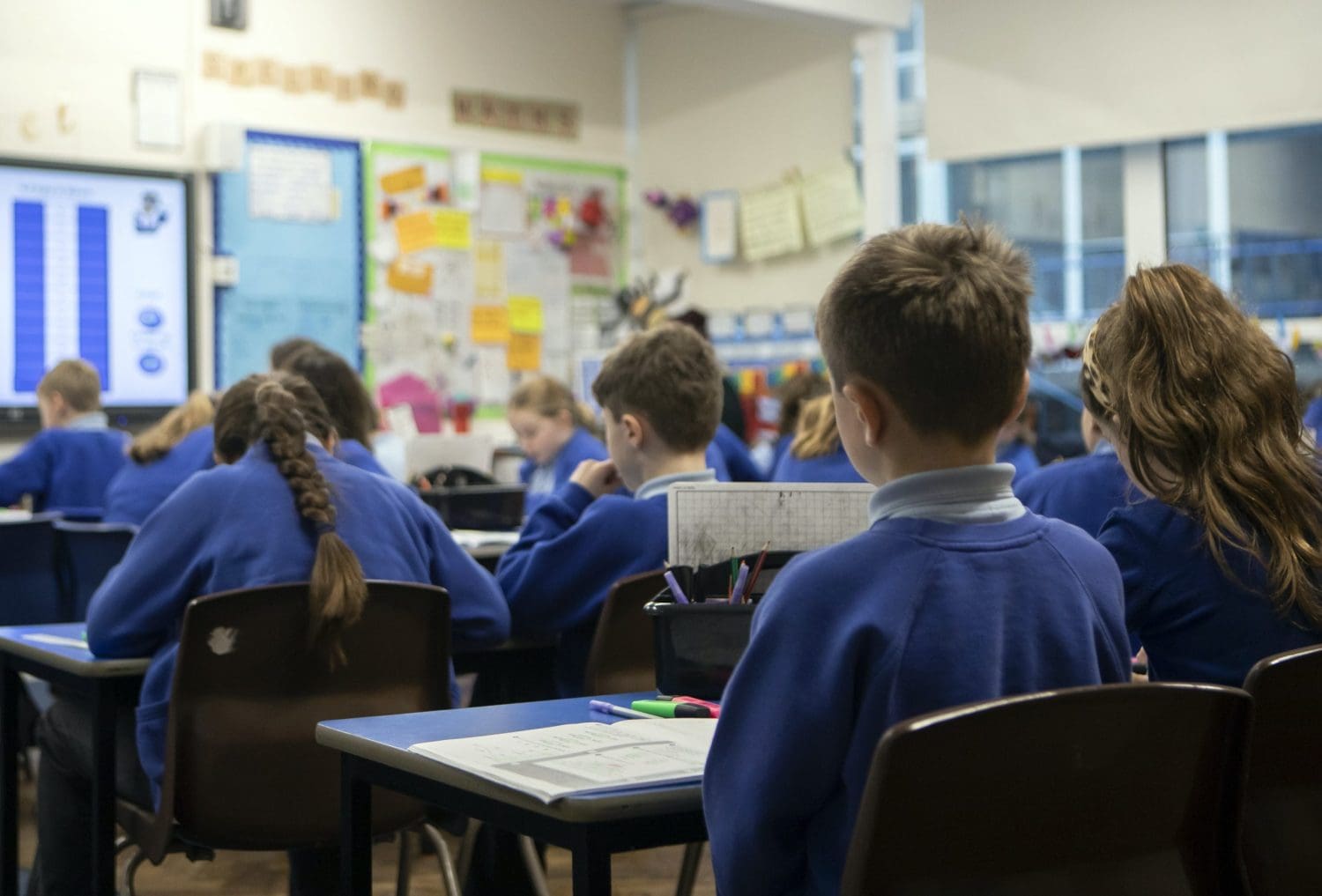 Primary school children in class