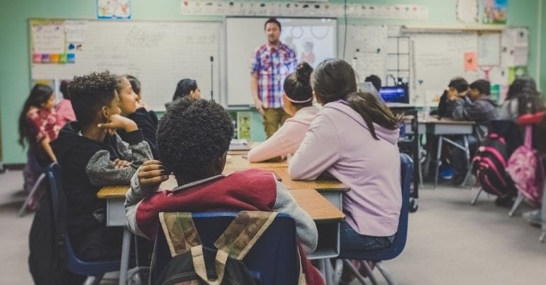 Young people sitting in a classroom