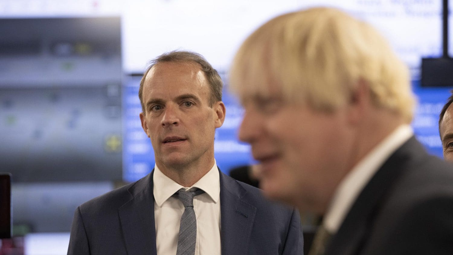 Dominic Raab looking at Boris Johnson