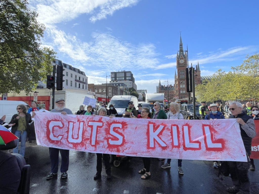 A photo of disabled people blocking Euston Road