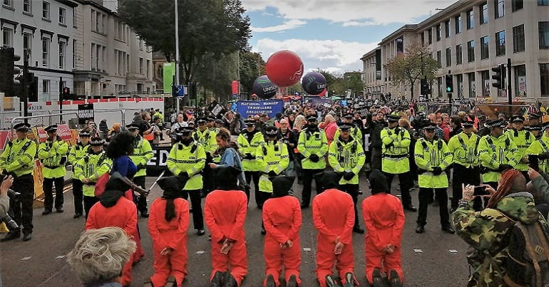 A photo of the Peoples Assembly Demo with a police line at the front