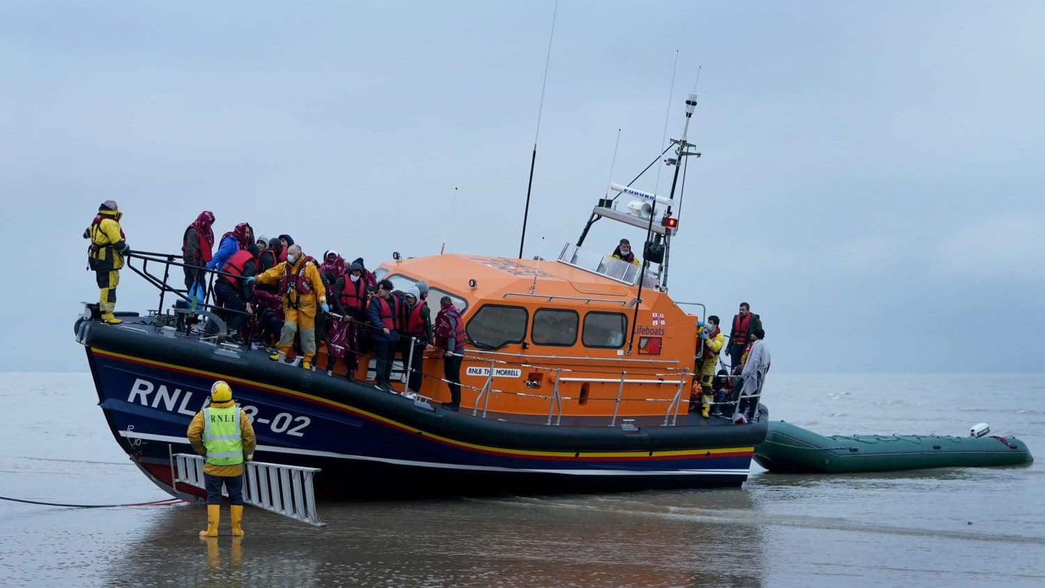 Migrants being rescued by an RNLI lifeboat