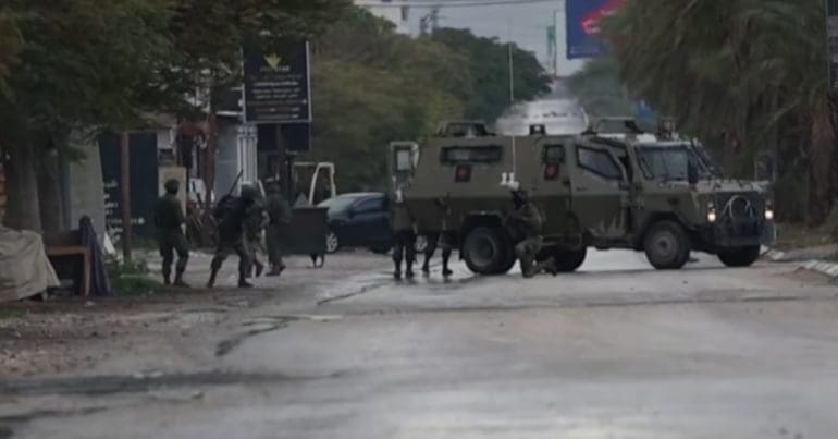 Israeli forces in Aqbat Jabr refugee camp in Palestine, as organisations calls for international solidarity against apartheid Israel