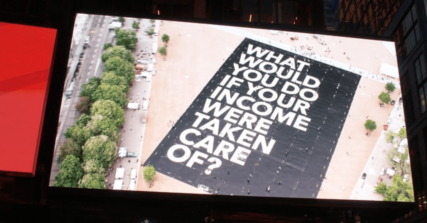 Basic Income sign on billboard