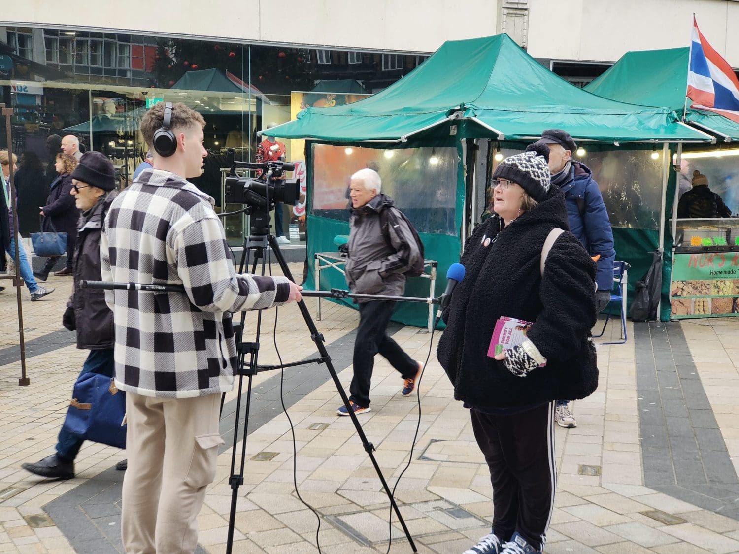 Paula Peters being interviewed in front of a camera 