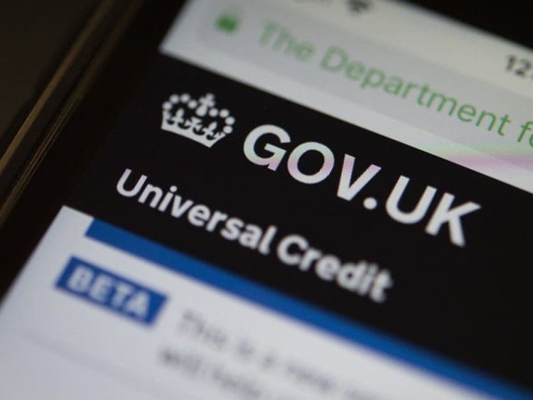 Universal Credit website on a phone DWP migration DWP benefit fraud tax credits