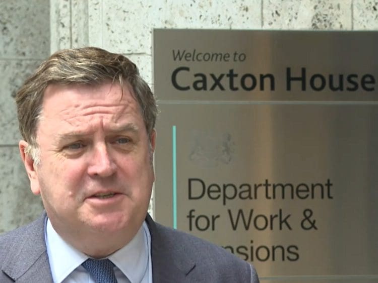 DWP boss Mel Stride in front of Caxton House Universal Credit benefits