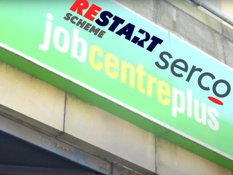 Jobcentre Plus sign over the entrance to a building, with Serco and the Restart Scheme logo superimposed on top DWP