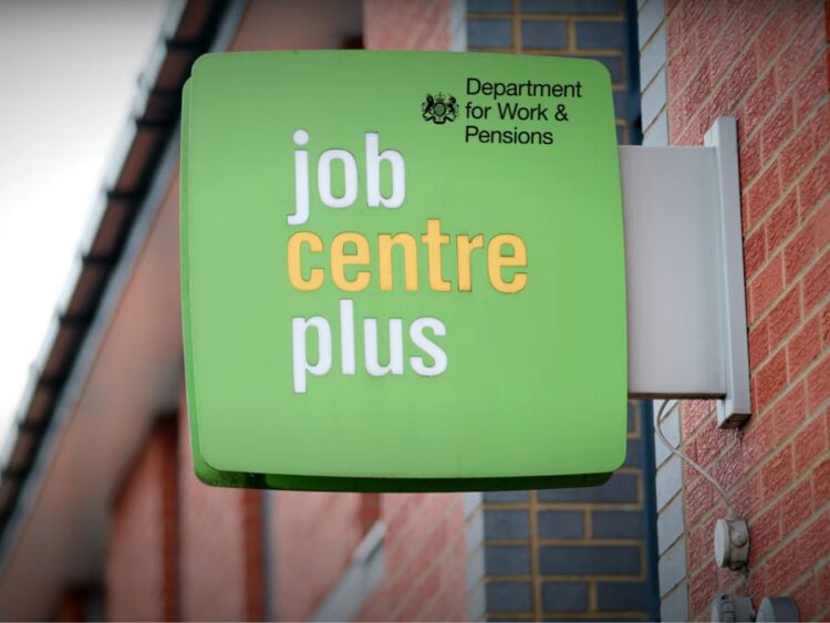 Jobcentre plus sign affixed to a building, with the DWP logo superimposed over it DWP sanctions Universal Credit