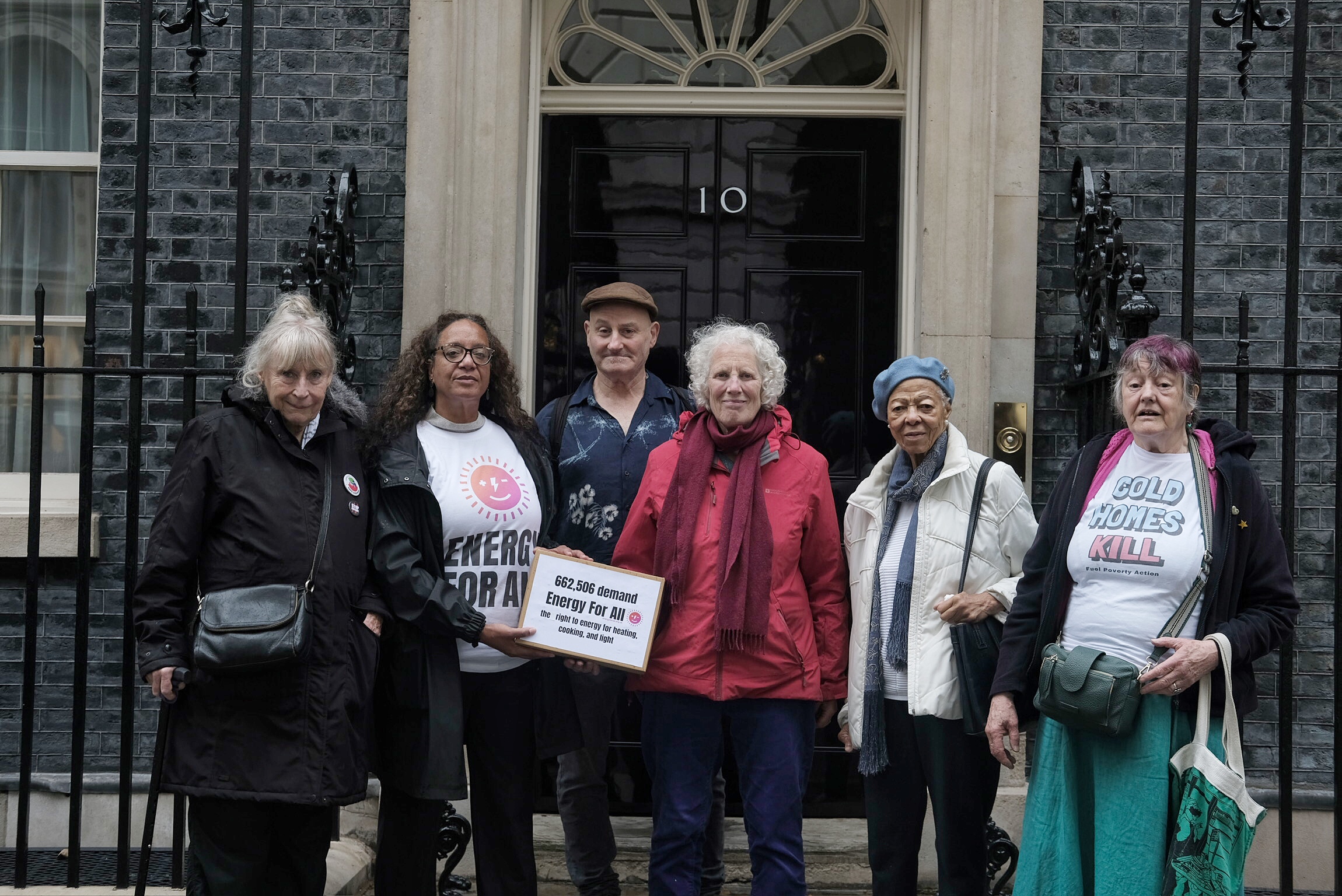 Campaigners gather together with their petition outside Number 10 Downing Street. 