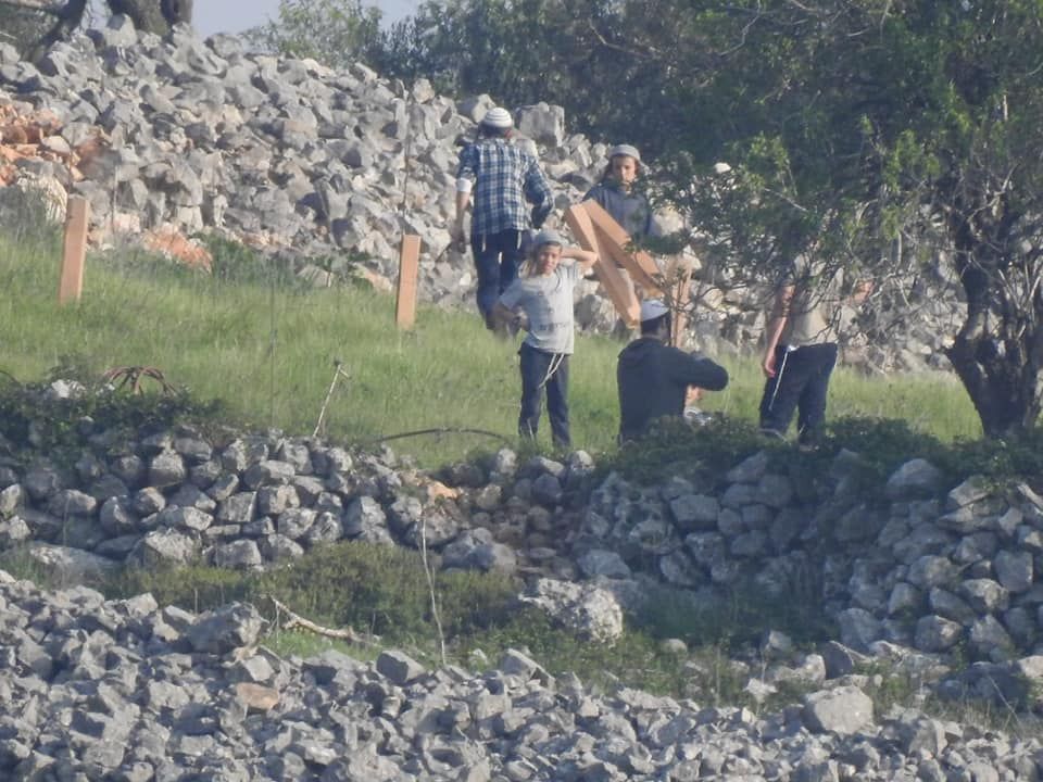 Settlers on Palestinian land.